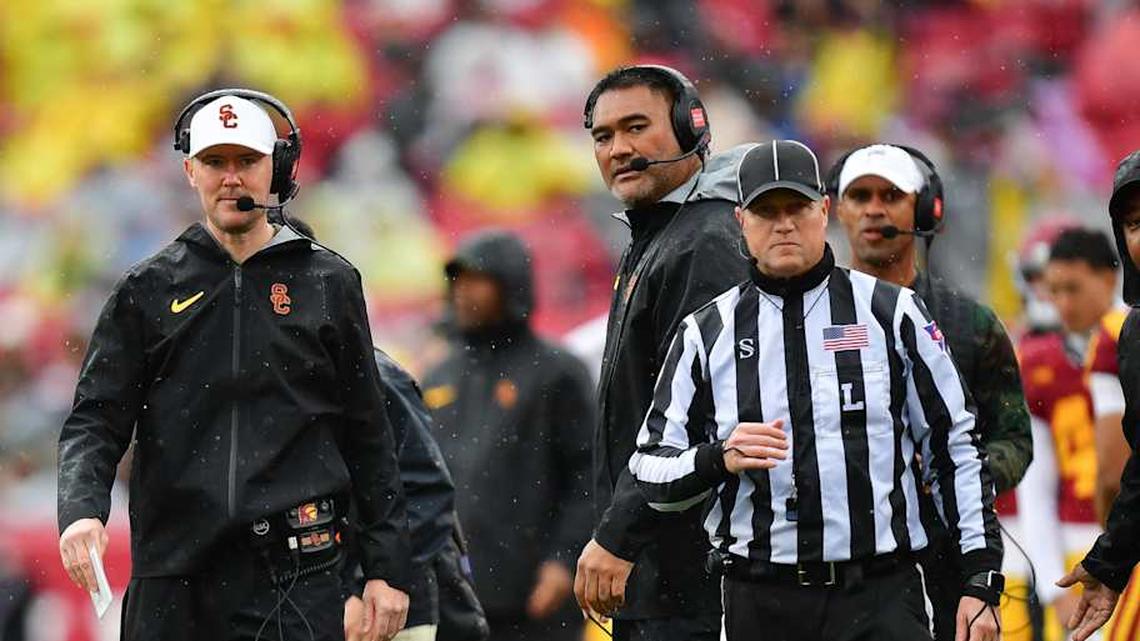  Nov 15, 2025; Los Angeles, California, USA; Southern California Trojans head coach Lincoln Riley watches game action against the Iowa Hawkeyes during the first half at the Los Angeles Memorial Coliseum. Mandatory Credit: Gary A. Vasquez-Imagn Images | Gary A. Vasquez-Imagn Images 