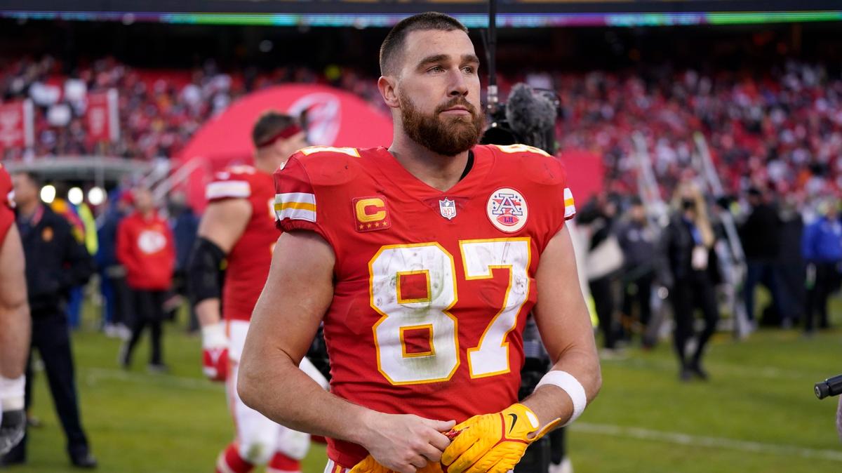 Kansas City Chiefs tight end Travis Kelce walks off the field after the AFC championship NFL football game against the Cincinnati Bengals, Sunday, Jan. 30, 2022, in Kansas City, Mo. The Bengals won 27-24 in overtime. (AP Photo/Paul Sancya)