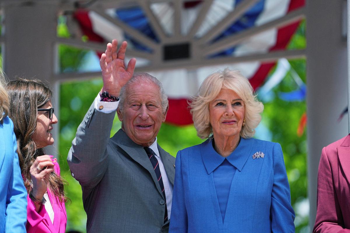 Britain's King Charles and Queen Camilla greet people on the final day of the state visit, in Front Royal, Virginia, U.S., April 30, 2026.    Matt Rourke/Pool via REUTERS