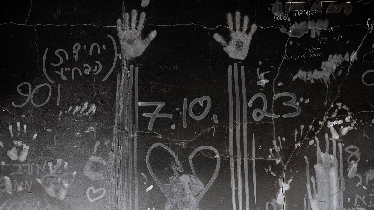 Hand prints and other markings made in the soot on a wall are seen, nearly a year since the deadly October 7 attack by Hamas, in Kibbutz Beeri, southern Israel, September 15, 2024. REUTERS/Amir Cohen