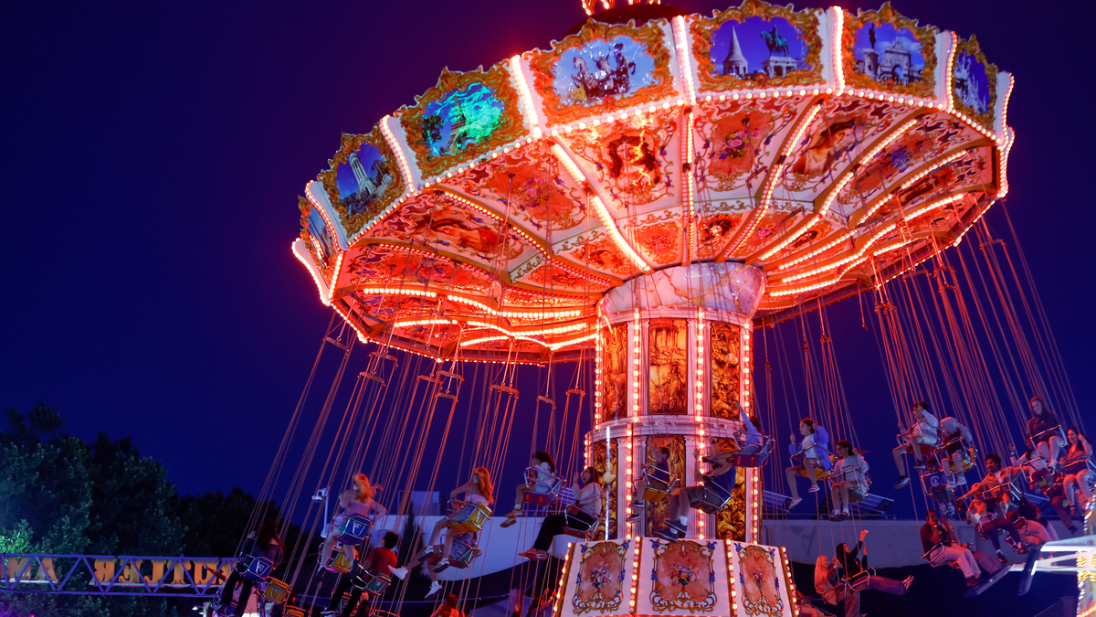 People ride the Wave Swinger at the Alameda County Fair in Pleasanton on Wednesday, July 2, 2025. (Shae Hammond/Bay Area News Group)