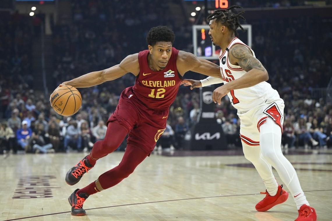                  Apr 8, 2025; Cleveland, Ohio, USA; Cleveland Cavaliers forward De’Andre Hunter (12) dribbles past Chicago Bulls guard Jahmir Young (17) in the first quarter at Rocket Arena. Mandatory Credit: David Richard-Imagn Images               