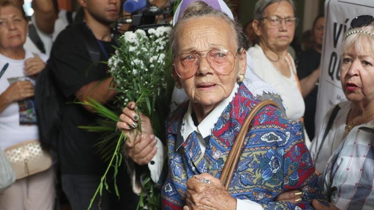 Carmen Navas, mother of Victor Hugo Quero Navas, attends mass in memory of her son in Caracas, Venezuela, on Friday, two days before her death. Venezuelan authorities confirmed Quero Navas died in state custody in July 2025, after his family had spent months seeking information about his whereabouts. Photo by Miguel Gutierrez/EPA
