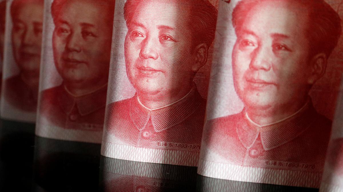 FILE PHOTO: Chinese yuan banknotes are seen in this illustration picture taken April 25, 2022. REUTERS/Florence Lo/Illustration/File Photo