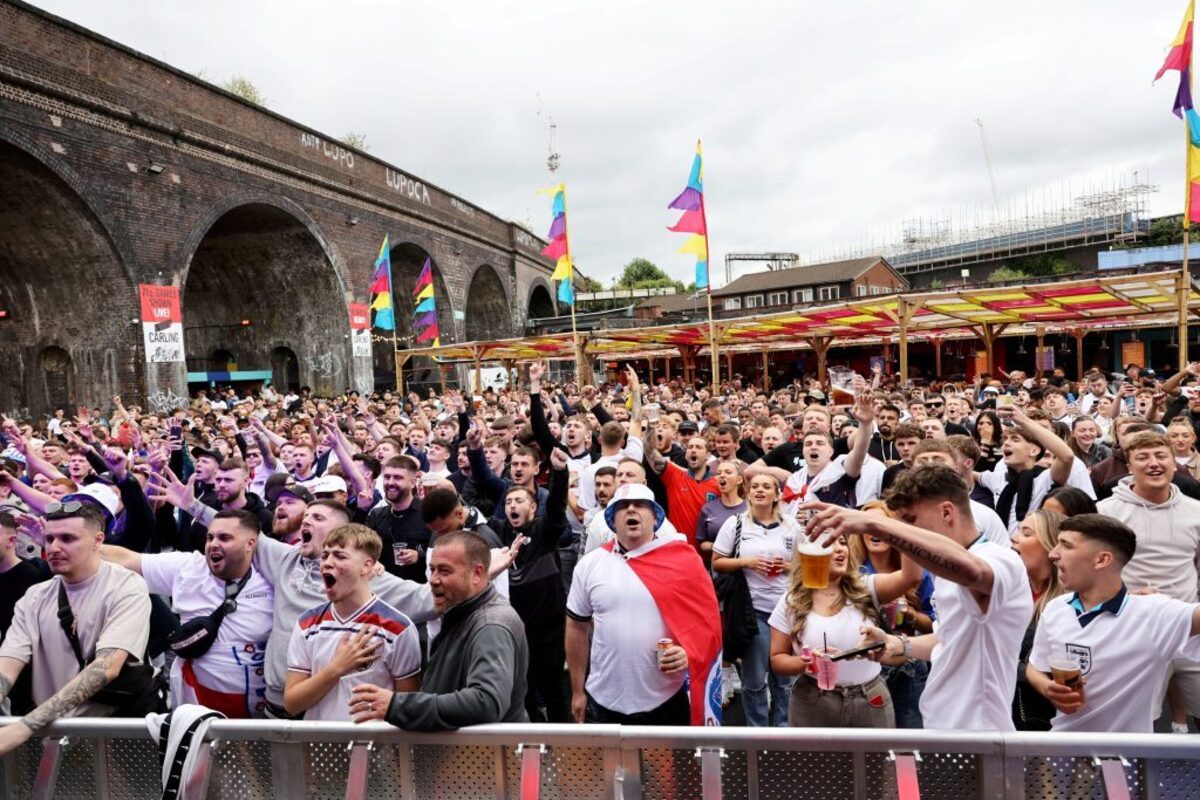  Football fans watch England play. (Anita Maric via SWNS) 