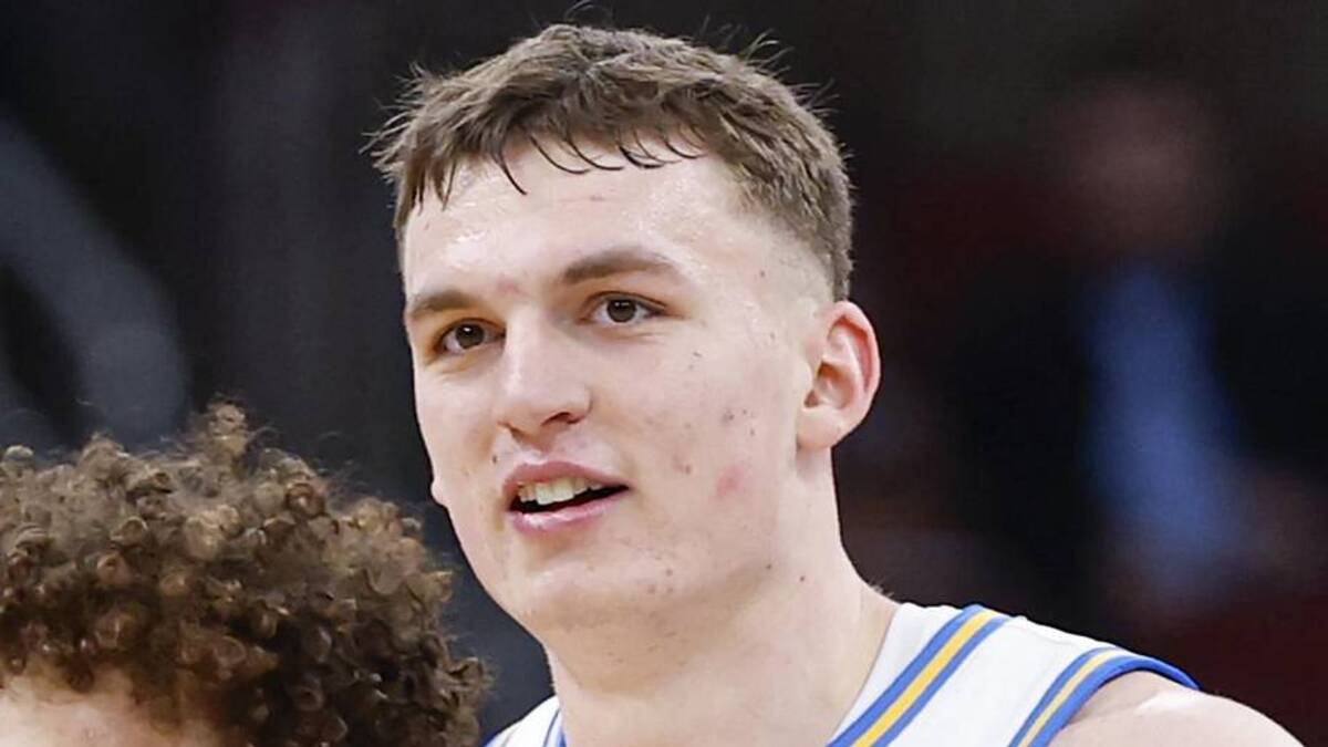  Mar 12, 2026; Chicago, IL, USA; UCLA Bruins guard Trent Perry (0) and forward Tyler Bilodeau (34) smile during the second half at United Center. Mandatory Credit: Kamil Krzaczynski-Imagn Images | Kamil Krzaczynski-Imagn Images 