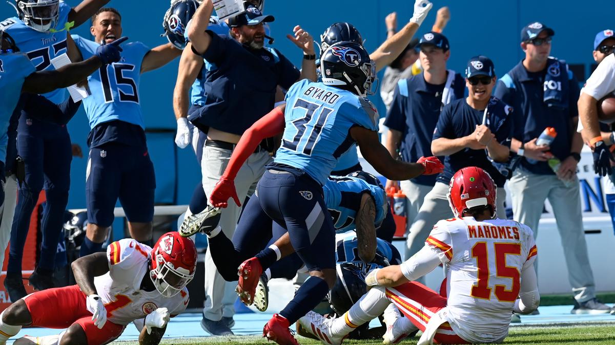 Kansas City Chiefs quarterback Patrick Mahomes (15) watches as his fumble is recovered by the Tennessee Titans in the first half of an NFL football game Sunday, Oct. 24, 2021, in Nashville, Tenn. Titans free safety Kevin Byard (31) caused the fumble. (AP Photo/Mark Zaleski)