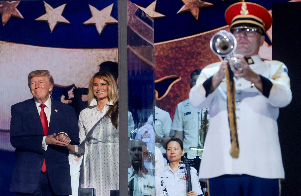 U.S. President Donald Trump and first lady Melania Trump attend a Fourth of July rally, marking the 250th anniversary of U.S. independence, on the National Mall in Washington, D.C., U.S., July 4, 2026.  REUTERS/Jonathan Ernst