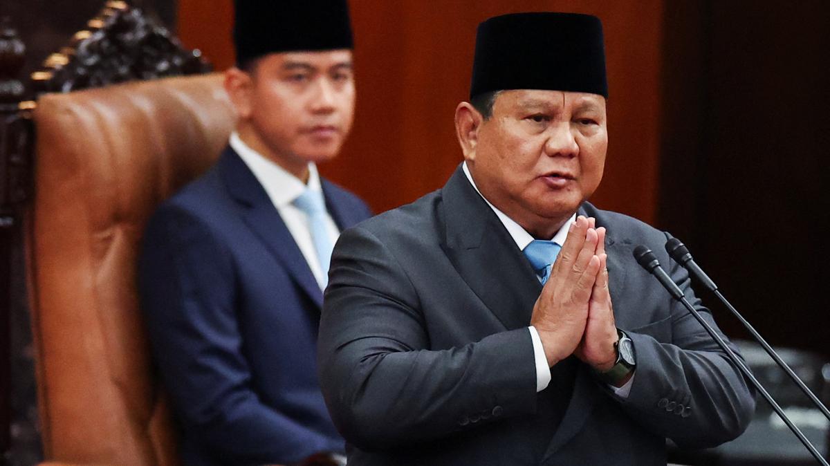 Indonesian President Prabowo Subianto gestures inside the parliament building, while Vice President Gibran Rakabuming Raka looks on near him, on the day Subianto is set to deliver his speech on economic policies and the 2027 fiscal plan in Jakarta, Indonesia, May 20, 2026. REUTERS/Willy Kurniawan