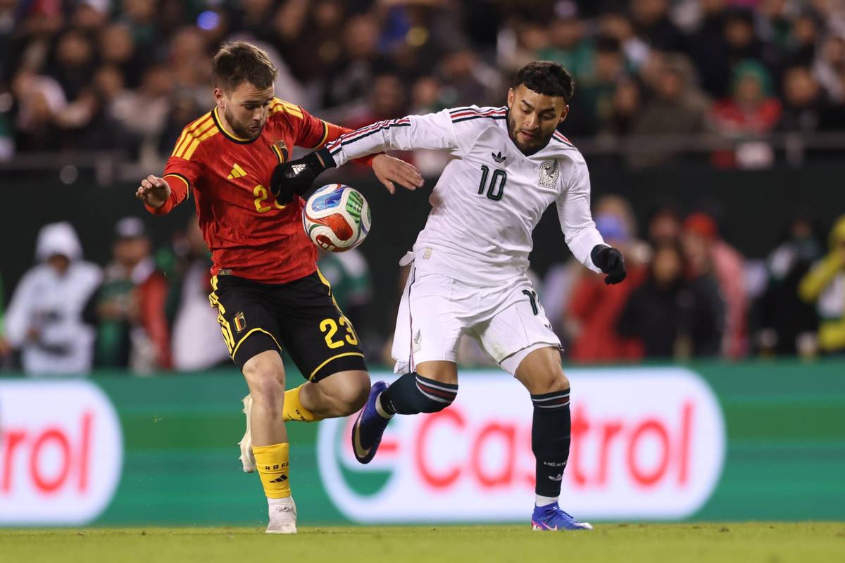  Alexis Vega #10 of Mexico battles with Nicolas Raskin #23 of Belgium during the second half at Soldier Field on March 31, 2026 in Chicago, Illinois. (Photo by Geoff Stellfox/Getty Images) Photo by Geoff Stellfox/Getty Images