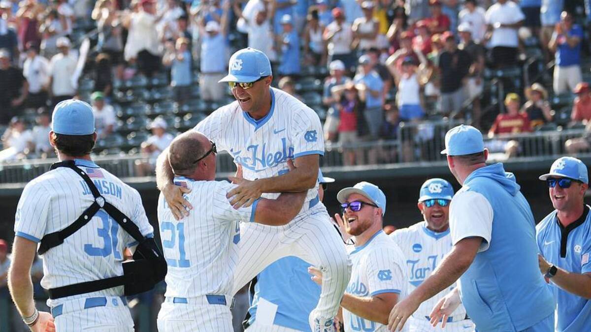  June 7, 2026; Chapel Hill, NC, USA; North Carolina Tar Heels head coach Scott Forbes celebrates a win with the coaching staff against the USC Trojans at Boshamer Stadium. Mandatory Credit: Zachary Taft-Imagn Images | Zachary Taft-Imagn Images 
