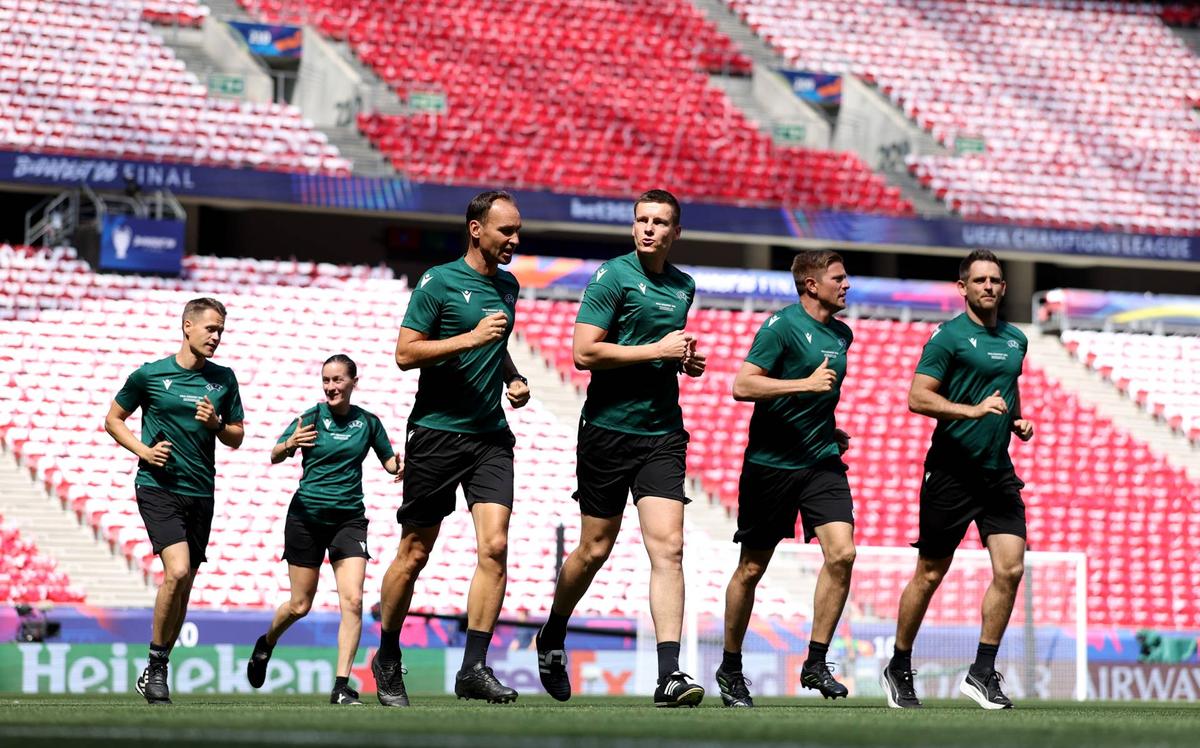  (L-R) Jan Siedel, Guadalupe Porras Ayuso, Bastian Dankert, Daniel Siebert, Robert Schroder and Rafael Foltyn run during the Referee Team Training Session at Puskas Arena on May 29, 2026 in Budapest, Hungary. (Photo by Michael Regan - UEFA/UEFA via Getty Images) Photo by Michael Regan - UEFA/UEFA via Getty Images
