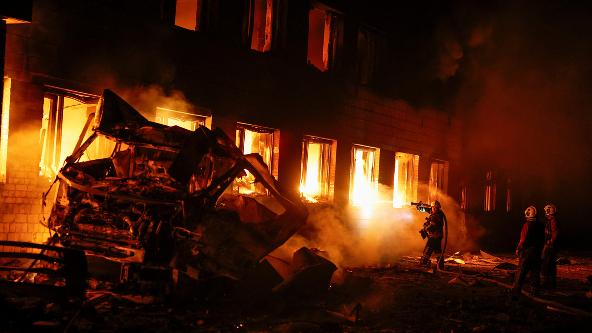 Firefighters work at a compound of a private enterprise damaged during Russian missile strikes, amid Russia's attack on Ukraine, in Kyiv, Ukraine July 16, 2026. REUTERS/Valentyn Ogirenko