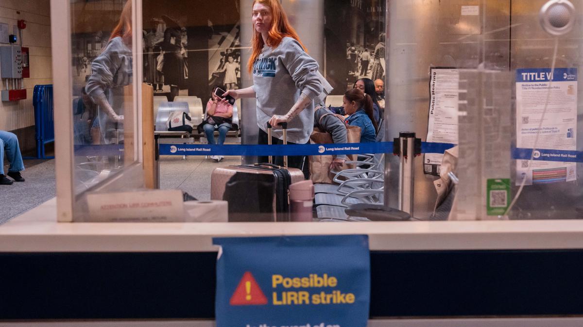 Midnight Strike Deadline Looms For LIRR Commuter Rail. NEW YORK, NEW YORK - MAY 15: Commuters wait in a waiting area as a sign warns of a possible strike on the Long Island Rail Road (LIRR) at Penn Station on May 15, 2026 in New York City. Commuters face major disruption as unions representing more than 3,500 workers prepare to strike from May 16, threatening to shut down the Long Island Rail Road  America's busiest passenger rail service  unless transit officials and labor leaders reach a last-minute contract agreement. (Photo by Adam Gray/Getty Images)