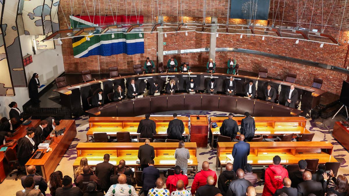 Judges take their seat at South Africa's Constitutional Court ahead of the ruling on whether the parliament failed to hold President Cyril Ramaphosa to account over the "Farmgate" scandal, involving allegations that foreign currency was hidden at his Phala Phala game farm, in Johannesburg, South Africa, May 8, 2026. REUTERS/Siphiwe Sibeko
