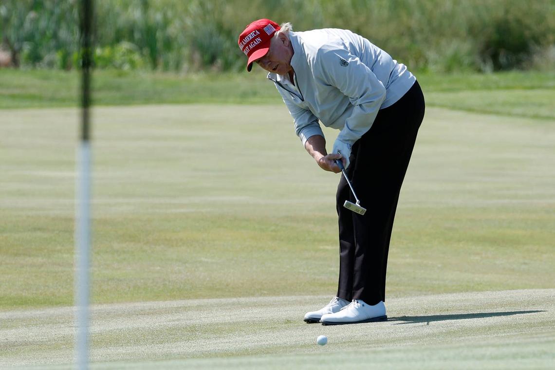  May 25, 2023; Washington, DC, USA; Former President Donald Trump putts on the sixth hole during the Pro-Am tournament as part of the LIV Golf Washington D.C. 2023 event at Trump National Golf Club outside Washington DC. Mandatory Credit: Geoff Burke-USA TODAY Sports 