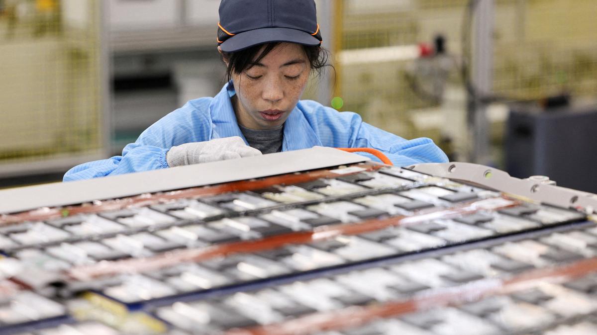 An employee works on a battery assembly line at the factory of Leapenergy, a unit of Leapmotor, during an organised media tour in Huzhou, Zhejiang province, China, April 26, 2026.  REUTERS/Go Nakamura