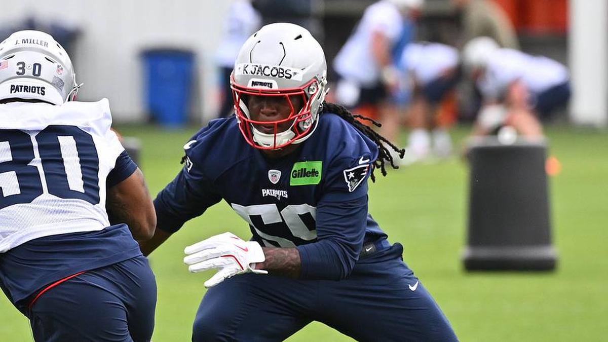  May 9, 2026; Foxborough, MA, USA; New England Patriots linebacker Khalil Jacobs (59) does a drill with running back Jam Miller (30) during the New England Patriots rookie camp at Gillette Stadium. Mandatory Credit: Eric Canha-Imagn Images | Eric Canha-Imagn Images 