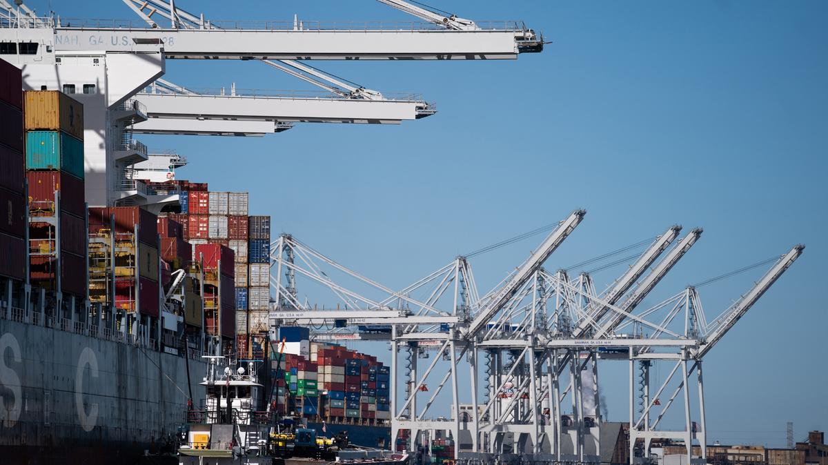 A tug boat handles a fueling barge next to the MSC Vigo container ship docked at the Garden City Port Terminal on Nov. 12, 2021, in Garden City, Georgia. (Sean Rayford/Getty Images/TNS)