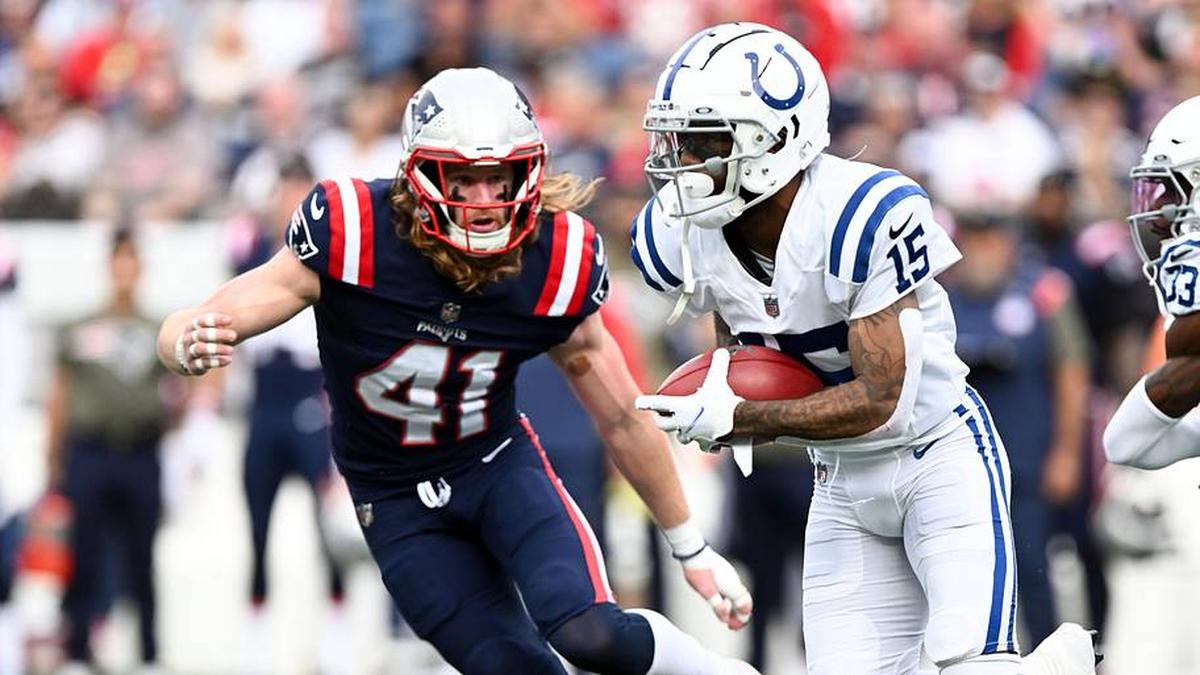  Nov 6, 2022; Foxborough, Massachusetts, USA; Indianapolis Colts wide receiver Keke Coutee (15) runs with the ball in front of New England Patriots safety Brenden Schooler (41) during the first half at Gillette Stadium. Mandatory Credit: Brian Fluharty-Imagn Images | Brian Fluharty-Imagn Images 