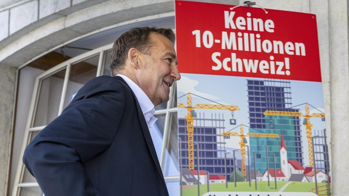National Council member Thomas Matter visits a polling station for the Swiss People's Party's "No 10-Million Switzerland Sustainability Initiative," in Aarberg, Switzerland, on Sunday. Photo by Peter Schneider/EPA