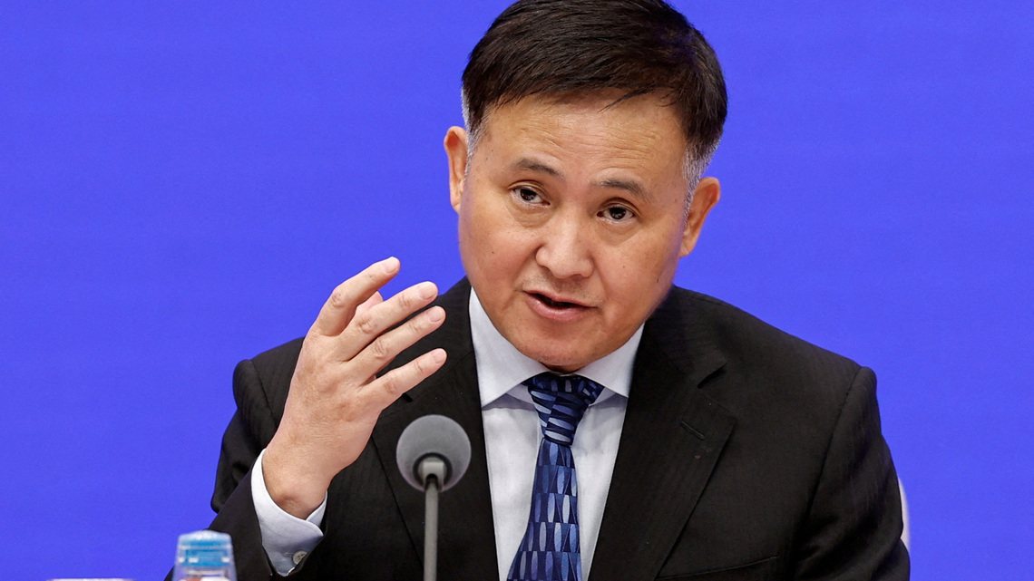 China's slower loan growth is the new normal, central bank governor says