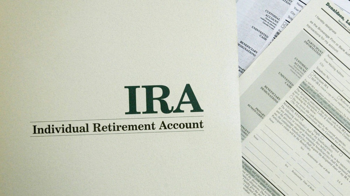  Dave Ramsey and Vanguard warn Americans on tax implications when using traditional IRAs and Roth IRAs. Getty Images