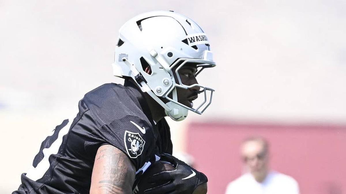  May 2, 2026; Henderson, NV, USA; Las Vegas Raiders running back Mike Washington Jr. (30) runs through a drill during a Rookie Minicamp at Intermountain Health Performance Center. Mandatory Credit: Candice Ward-Imagn Images | Candice Ward-Imagn Images 