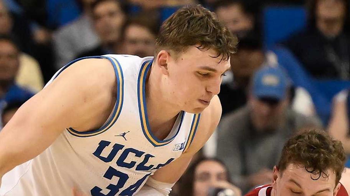  Mar 3, 2026; Los Angeles, California, USA; UCLA Bruins forward Tyler Bilodeau (34) and Nebraska Cornhuskers guard Cale Jacobsen (31) chase a loose ball during the 2nd half at Pauley Pavilion presented by Wescom Financial. Mandatory Credit: Robert Hanashiro-Imagn Images | Robert Hanashiro-Imagn Images 