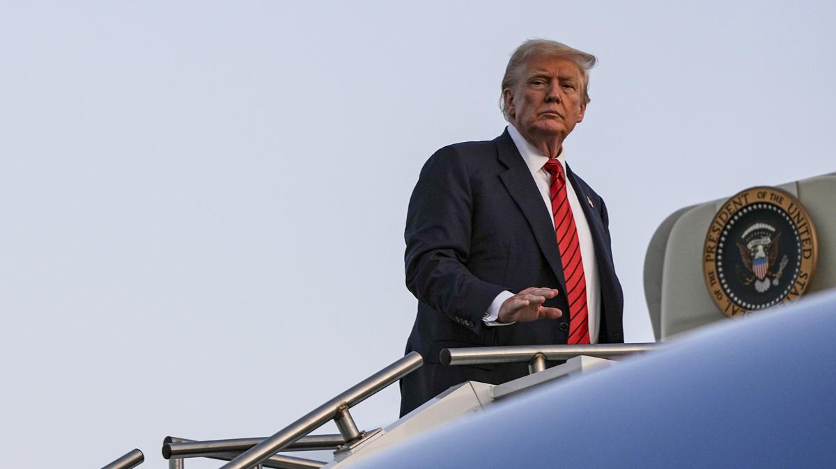 President Donald Trump boards Air Force One as he departs Lehigh Valley International Airport in Allentown, Pa., Aug. 3, 2025.