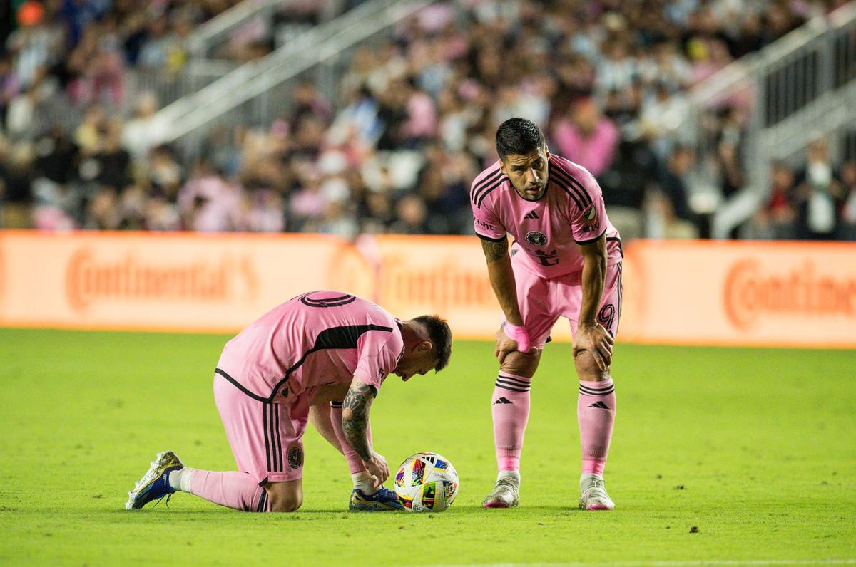  Lionel Messi and Luis Suarez prepare for a free-kick during a friendly match between Inter Miami and Newell's Old Boys. Photo by Arturo Jimenez/Anadolu via Getty Images