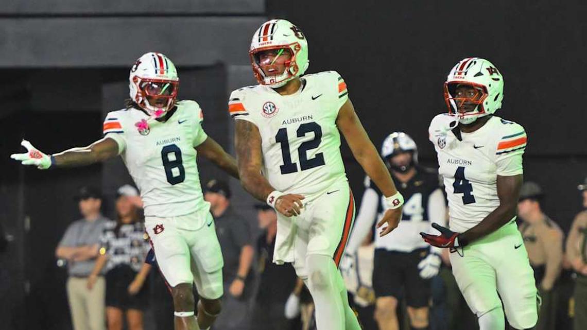  Nov 8, 2025; Nashville, Tennessee, USA; Auburn Tigers quarterback Ashton Daniels (12) celebrates his touchdown against the Vanderbilt Commodores during the second half at FirstBank Stadium. Mandatory Credit: Steve Roberts-Imagn Images | Steve Roberts-Imagn Images 