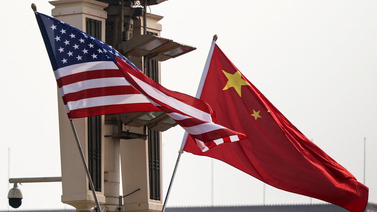 U.S. and China’s national flags flutter in Tiananmen Square, ahead of U.S. President Donald Trump's visit to China, in Beijing, China, May 13, 2026. REUTERS/Maxim Shemetov