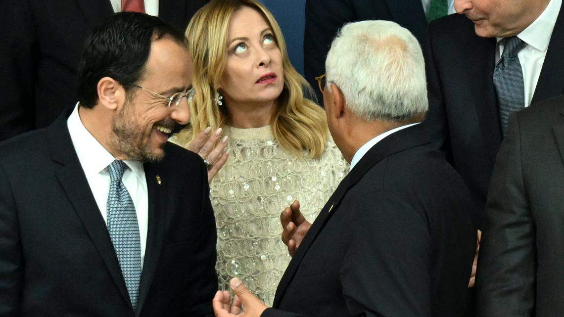 Italy's Prime Minister Giorgia Meloni, center, has a conversation with Cyprus' President Nikos Christodoulides, left, and European Council President Antonio Costa after a working session of the European Council on Friday, April 24, 2026.