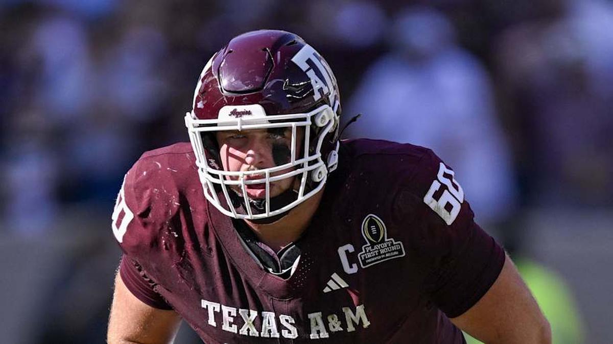  Dec 20, 2025; College Station, TX, USA; Texas A&M Aggies offensive lineman Trey Zuhn III (60) lines up during the game between the Aggies and the Hurricanes at Kyle Field. Mandatory Credit: Jerome Miron-Imagn Images | Jerome Miron-Imagn Images 