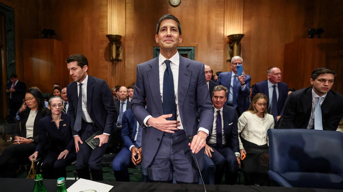 FILE PHOTO: Kevin Warsh, U.S. President Donald Trump's nominee to be next chair of the Federal Reserve, at the end of a Senate Banking Committee confirmation hearing on Capitol Hill in Washington, D.C., U.S., April 21, 2026. REUTERS/Kevin Lamarque/File Photo