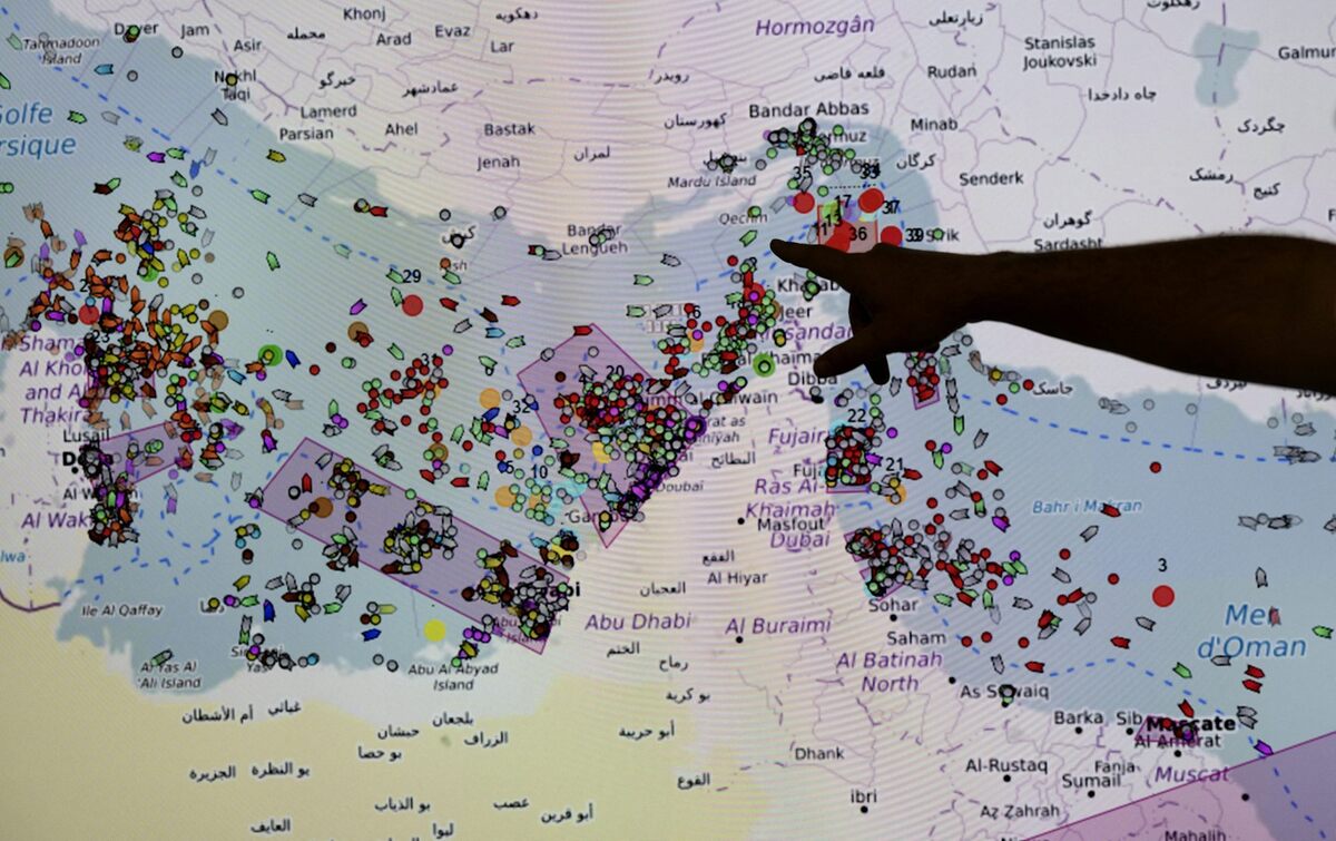  A man points toward the positions of ships in the Strait of Hormuz on a screen at the Maritime Information and Cooperation and Awareness Center in Brest, France, on April 27, 2026. Fred Tanneau/AFP via Getty Images 
