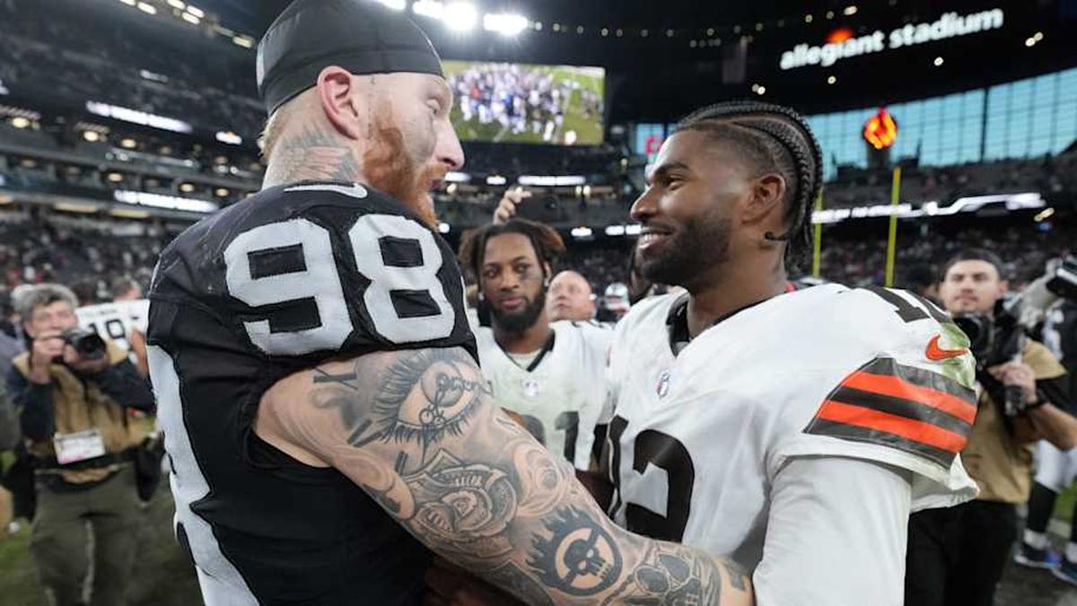  Nov 23, 2025; Paradise, Nevada, USA; Las Vegas Raiders defensive end Maxx Crosby (98) and Cleveland Browns quarterback Shedeur Sanders (12) embrace after the game at Allegiant Stadium. Mandatory Credit: Kirby Lee-Imagn Images | Kirby Lee-Imagn Images 