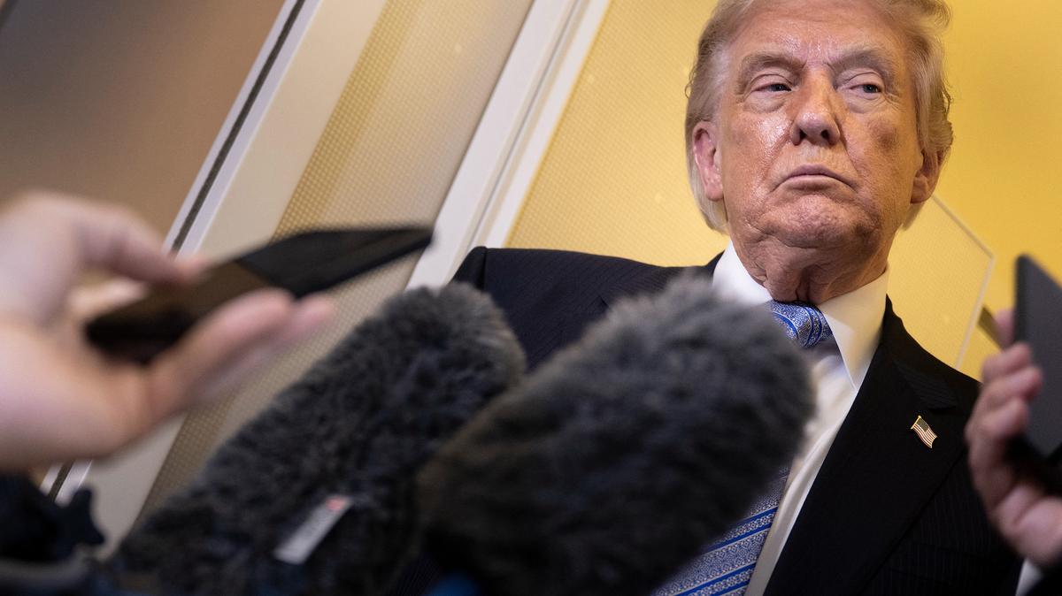U.S. President Donald Trump speaks to reporters aboard Air Force One after his departure from Beijing Capital Airport on Friday, May 15, 2026, on his way back to the United States. (Brendan Smialowski/AFP/Getty Images/TNS)