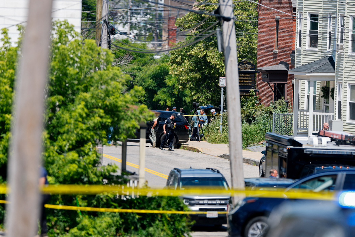 Police work at a scene of a shooting involving U.S. Immigration and Customs Enforcement (ICE) in Biddeford, Maine, U.S. July 13, 2026.  REUTERS/CJ Gunther
