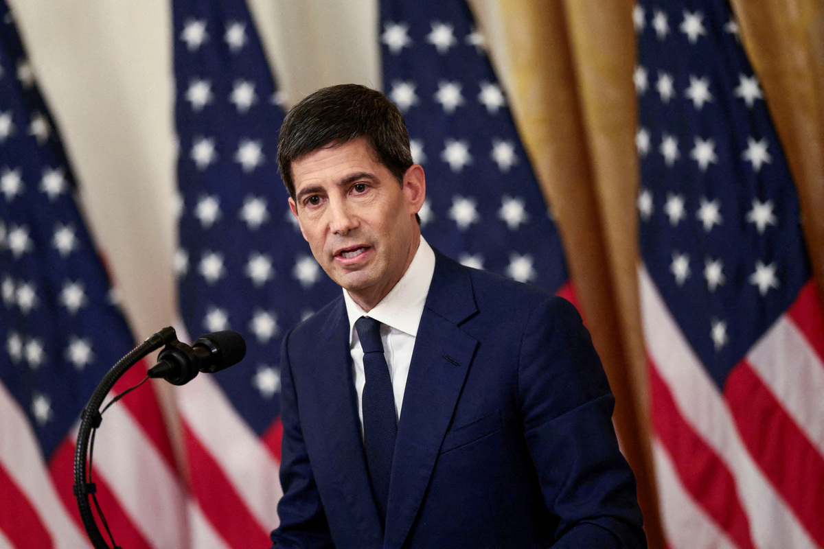 FILE PHOTO: Federal Reserve Chair Kevin Warsh delivers a speech on the day of his swearing-in ceremony, in the East Room of the White House in Washington, D.C., U.S., May 22, 2026. REUTERS/Evelyn Hockstein/File Photo