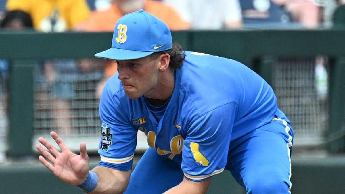  Jun 14, 2025; Omaha, Neb, USA; UCLA Bruins shortstop Roch Cholowsky (1) fields a ground ball against the Murray State Racers during the ninth inning at Charles Schwab Field. Mandatory Credit: Steven Branscombe-Imagn Images | Steven Branscombe-Imagn Images 