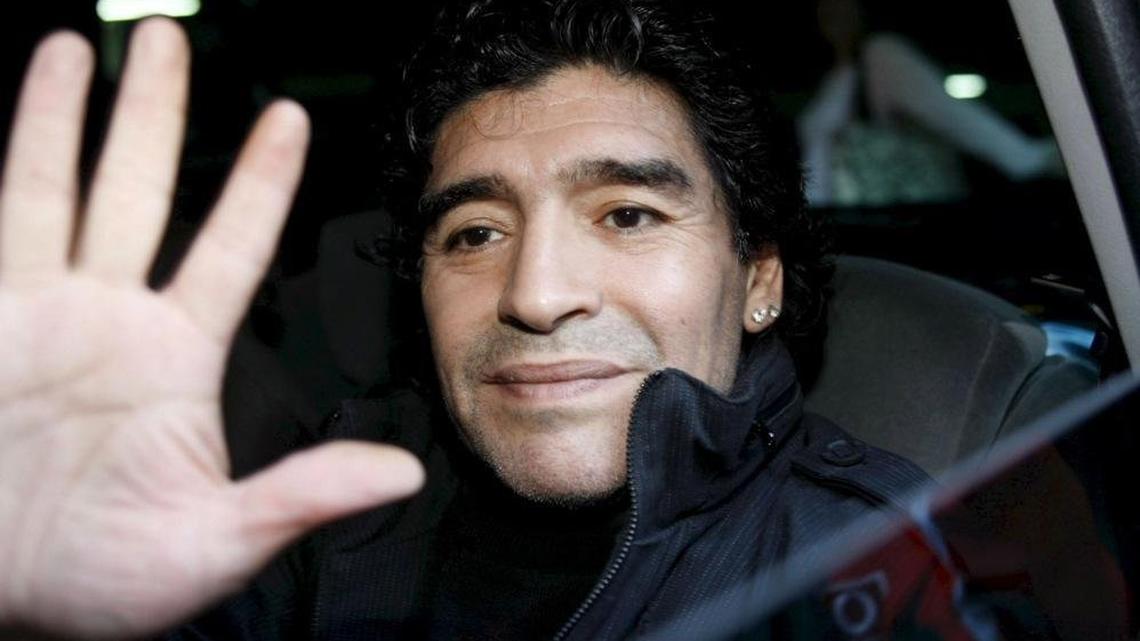  Argentinian soccer legend Diego Armando Maradona waves to photographers as he leaves a hotel in Barcelona, Spain, in September 2008, after meeting FC Barcelona's Argentinian striker Lionel Messi. Maradona died at age 60 on November 25, 2020, after a heart attack. The Argentine soccer great led his country to the 1986 World Cup. File Photo by Alberto Estevez/EPA
