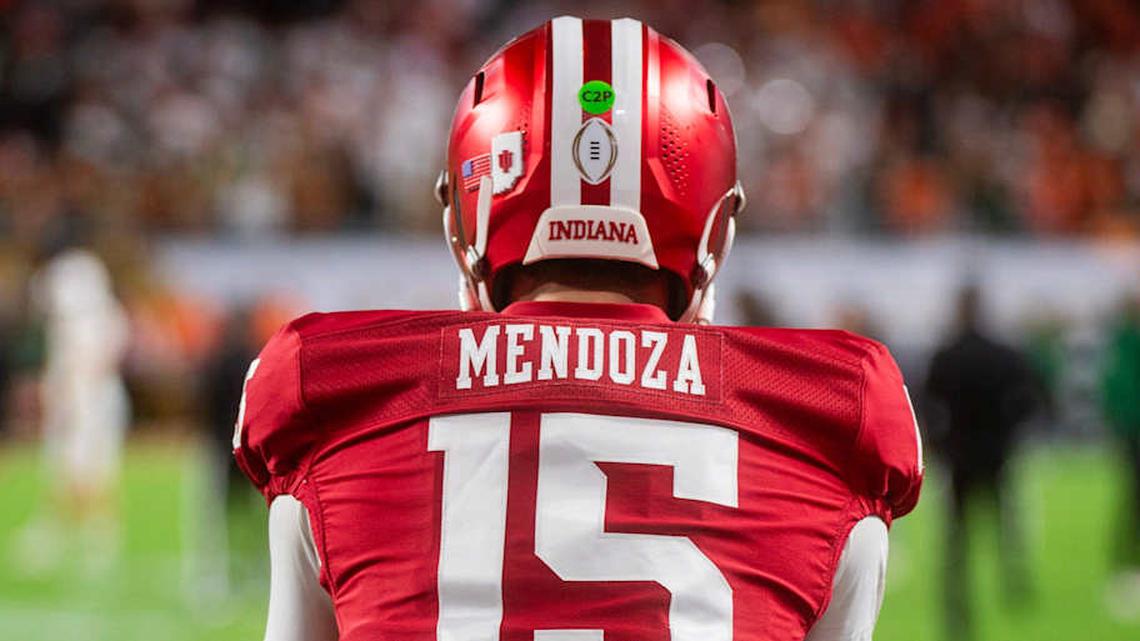  Indiana's Fernando Mendoza (15) gets loose before the College Football Playoff National Championship college football game at Hard Rock Stadium in Miami Gardens on Monday, Jan. 19, 2026. | Rich Janzaruk/Herald-Times / USA TODAY NETWORK via Imagn Images 