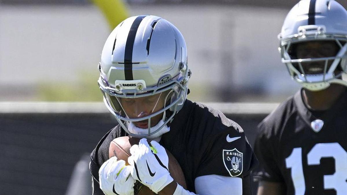  May 20, 2026; Henderson, NV, USA; Las Vegas Raiders wide receiver Tre Tucker (1) practices during organized team activities at Intermountain Health Performance Center. Mandatory Credit: Candice Ward-Imagn Images | Candice Ward-Imagn Images 