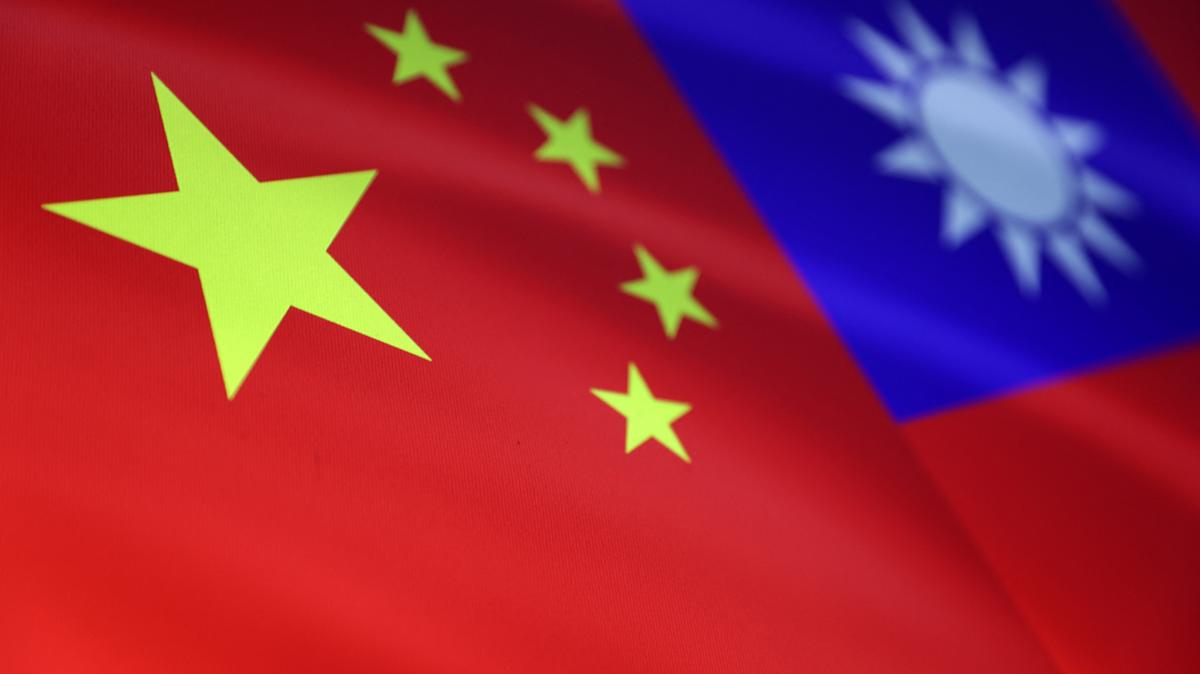 Chinese and Taiwanese flags are seen in this illustration, August 6, 2022. REUTERS/Dado Ruvic/Illustration