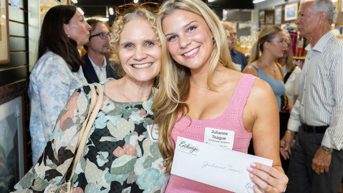 Scholarship recipient Julienne Teague, right, celebrates with her mother, Trudy Teague, at The Exchange’s 2026 Grants and Scholarship Awards event.