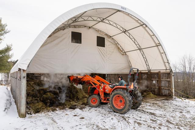  Student Lew Collet works on his tractor skills at Sterling College in Craftsbury Common, Vermont, which will close for good at the end of this semester. Credit: Oliver Parini for The Hechinger Report