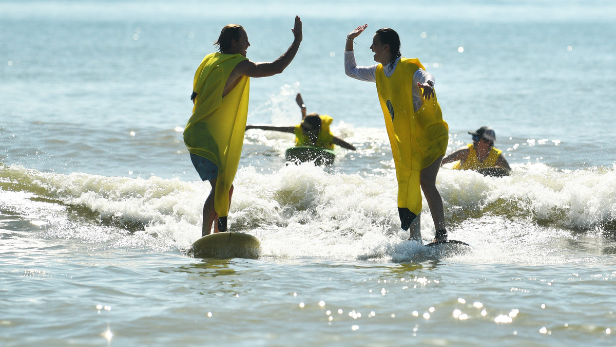 Sun Bum, a local sunscreen company, held a Smells Like Summer Tour event Sunday, June 21 at Minutemen Causeway in Cocoa Beach.trying to set a world record for the most people surfing in banana suits.