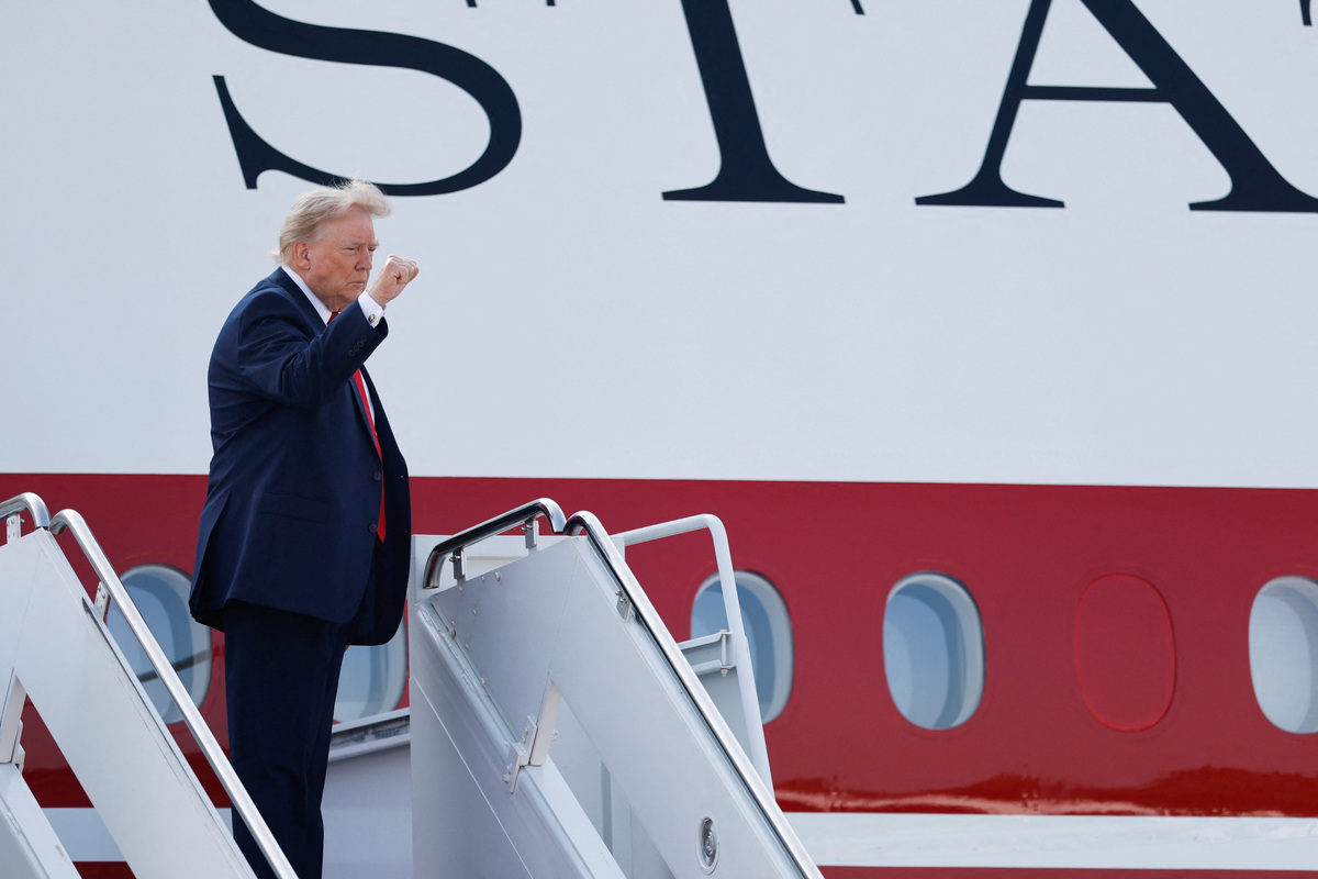 U.S. President Donald Trump gestures as he boards the new Air Force One, a plane gifted by the Qatari government, at Joint Base Andrews, Maryland, U.S., July 1, 2026. REUTERS/Kylie Cooper